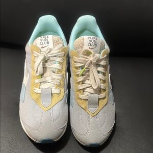 Nike Sun Club Sneakers in Light‎ Blue and Beige.